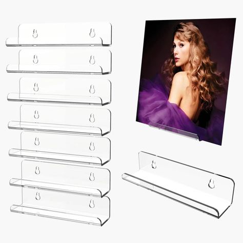 PRICES MAY VARY. Premium Clear Record Shelf - Clear acrylic vinyl record wall mount enables you to well display your vinyl records without covering any corner. Easy to install with screws and the holder is durable to hold max 2KG. Easy Access To Daily Listening Album- It makes listening to your favorite album easy with the quick access wall mounted Vinyl display unit. Great Gift For Music Lovers - This vinyl record storage is a perfect gift for music lovers who has many single vinyl record colle Acrylic Vinyl Shelf, Vinyl Shelf Storage, Vinyl Holder Wall, Bunny Apartment, Vinyl Records On Wall, Record Holder Wall, Vinyl Organization, Records Display, Record Shelf Wall