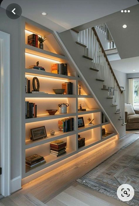 Stairs In Hall, Book Shelves Under Stairs, Under Curved Stairs Ideas, Under Stair Shelving, Staircase Cabinet Design, Bookcase Under Stairs, Indoor Stairs Ideas, Open Under Stairs Ideas, Cozy Staircase