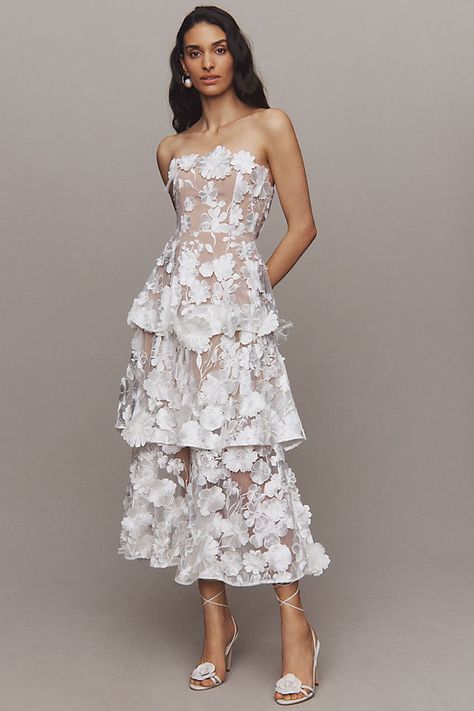 Make a statement in the Elliatt Selene Strapless 3D Floral Lace Tiered Maxi Dress, an exquisite garment that combines timeless elegance with modern flair. | Selene Strapless 3D Floral Lace Tiered Maxi Dress by Elliatt in White, Women's, Size: Large, Polyester at Anthropologie Elliatt Dress, Quinceanera Dresses Black, Quinceanera Dresses Red, Purple Quinceanera Dresses, Black Quinceanera Dresses, Red Quinceanera Dresses, Quinceanera Dresses Blue, Princess Wedding Dresses, Suzhou