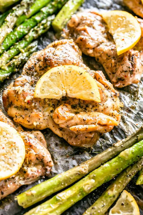 Lemon Garlic Butter Chicken Thighs, Garlic Butter Chicken Thighs, Baked Lemon Garlic Chicken, Keto Sausage Recipe, Lemon Garlic Butter Chicken, Lemon Garlic Chicken Thighs, Asparagus Chicken, Lemon Chicken With Asparagus, Garlic Herb Chicken