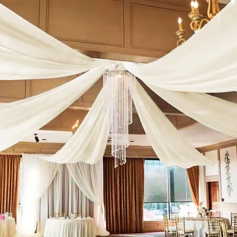 PRICES MAY VARY. 🍸Chiffon Ceiling Drapes: The package include 6 panels ivory wedding ceiling drapes (without hanging pieces). Each wedding extra long curtain measure for 5 feet width x 20 feet length. The sufficient quantity can meet your demands for decorating your weddings, parties, receptions. It will help to create a delicate and aesthetic sense to your wedding ceiling decoration. 🍸Romantic Sheer Arch Drapes: The wedding ceiling curtains are finished with firm and exquisite stitching in al Ceiling Decorations For Party, Fabric Arch, Wedding Ceiling Decorations, Ceiling Drapes, Arch Draping, Extra Long Curtains, Draping Wedding, Ceiling Decorations, Wedding Ceiling