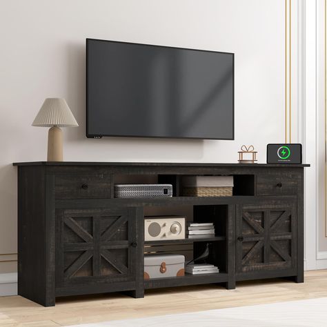 PRICES MAY VARY. Farmhouse TV stand: This TV console is designed to accommodate televisions up to 80 inches, making it an ideal choice for almost any home entertainment setup; Also, it doubles as an attractive storage cabinet to display family photographs or decorative items to enhance the warmth of your living space Integrated Charging Station: The rustic TV stand includes a power outlet that can conveniently charge your electronic devices, such as phones, tablets, or headphones, directly from Dark Tv Console, Dark Farmhouse Living Room, Tv Console Ideas Living Rooms, 80 Inch Tv, Tv Stand For Living Room, 70 Inch Tv Stand, Tv Stand Entertainment Center, Partition Storage, Movable Partition