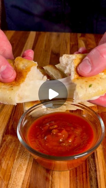 Bryan Dalton on Instagram: "Cheesy Breadsticks  These were so quick and easy… You’ve gotta try em  Start to finish in 15 minutes!  Start by rolling out your dough or just getting some premade from the store. Place on Parchment paper and separate your mozzarella cheese sticks on the dough giving yourself at least a 1/2” gap. Use egg wash on the edges and between the cheese sticks. Fold your dough over the cheese and press down firmly along the edges and between the sticks of cheese. Cover the dough in more egg wash. Bake at 425° for 10 minutes or recommended temperature/time. Once done, cover in herb butter. Slice into your individual cheese sticks and serve with marinara or your favorite dipping sauce!  #cheesy #pizzadough #cheesesticks #cheesybread #cheesebread #appetizers #foodlover #bak Easy Cheese Breadsticks, Easy Cheese Bread Sticks, Cheese Sticks With Pizza Dough, Easy Cheesy Breadsticks, Smoked Pork Tenderloin Recipes, Cheese Bread Sticks, Cheesy Breadsticks, Mozzarella Cheese Sticks, Cheesy Bread