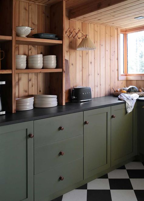 Modern Knotty Pine Cabin, Updated Cabin Kitchen, Green Cabinets Log Cabin, Small Chalet Kitchen Ideas, Kitchen In A Wooden House, Wooden Interior Walls, Mid Century Cabin Kitchen, Wood Panel Kitchen Walls, Hunter Green Cabin