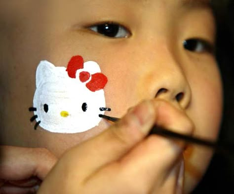 face paint Hello Kitty Face Paint, Kids Face Painting Easy, Easy Face Painting Designs, Cool Face Paint, Kitty Face Paint, Cheek Art, Girl Face Painting, Face Painting Easy, Kids Face Paint