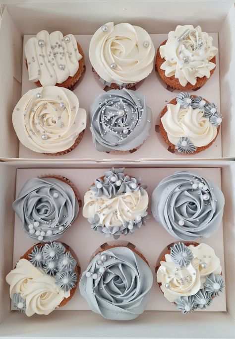 Blue And White Flower Cupcakes, Something Blue Bridal Shower Cupcakes, Dusty Blue And Sage Green Wedding Cupcakes, Grey Cupcakes Ideas, Wedding Cupcakes Ideas Simple Blue, White Cupcake Designs, 25th Anniversary Cupcakes, Cupcake Arrangements Birthday, Celebration Of Life Cupcakes