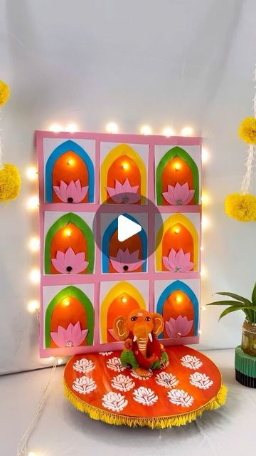 Shilpi Ghosh - DIY/ Homedecor/ plants on Instagram: "You all know my love for jharokha so here it is… Ganapati decoration in jharokha theme using cardboard, some coloured paper and lights…  I want to try it last year only but any how nahi ho paya so iss saal bana Diya…. Hopefully u love this simple Ganapati decor idea…  ( Ganapati decoration, cardboard craft, paper crafts, jharokha, Bappa, festive DIY, festive decor, India decor ideas)  #budgetfriendly #ecofriendly #bestoutofwaste #festivaldecor #ganpatidecoration" Simple Ganesha Decoration Ideas, Ganapati Decoration Theme, Ganesha Decoration Ideas, Ganpati Decoration Theme, India Decor, Decoration Theme, Cardboard Craft, Ganapati Decoration, Coloured Paper