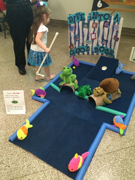 Turtle, frog and ocean books inspired mini golf. Pool Noodle Golf Course, Mini Golf Classroom, Golf Office Ideas, Miniature Golf Course Diy, Library Mini Golf, Mini Golf Course Diy, Diy Mini Golf Course Ideas, Diy Mini Golf, Mini Golf Party