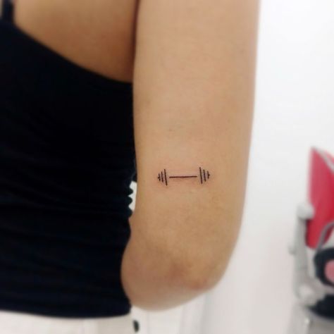 Weight Tattoo Ideas, Minimalist Barbell Tattoo, Dumbell Tattoo Women, Tiny Barbell Tattoo, Fitness Inspired Tattoos, Small Barbell Tattoo, Dumbbell Tattoo Design For Women, Weight Tattoo Fitness, Everything Works Out Tattoo