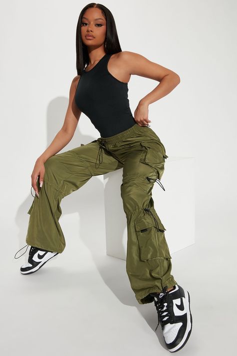 Available In Charcoal, White, Olive, And Pink. Wide Leg Pant Toggle Drawstring Waistband Functional Side Cargo Pockets Elasticized Drawstring Detailing Throughout Toggle Ankle Jogger Hem Non-Stretch Nylon 100% Polyester Imported | Rush Rush Parachute Pant in Olive Green size Small by Fashion Nova Parachute Pant, Loose Clothes, Olive Fashion, Shoe Wishlist, Loose Outfit, Wide Leg Pant, Drawstring Waistband, Fashion Pants, Parachute Pants