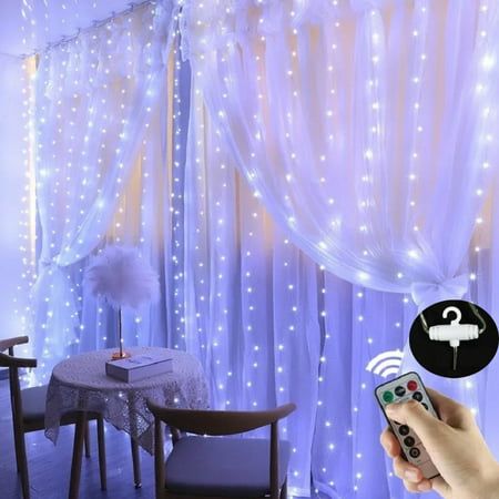 The LED lights waterfall provide bright but not overwhelming elegant soft glow. It serves as night light, mood lighting or just extra accent lighting for any dark and dull place. 9.8ft x 9.8ft 300 LED Fairy Curtain Lights LED Color: Cool White It's enough to cover most of standard windows, walls and even perfect to wrap it around a canopy bed or pergola in the backyard. The 5VDC USB curtain of LED lights run very cool and will not overheat. Cool to touch and safe to be covered by any kind of curtains, sheers and tapestry. 8 flash models by remote controller Changing any model as today's mood.It is a cool addition that there are various setting options, such as twinkle and flash in different patterns. Easy to cycle through 8 modes via press the button by remote controller. Combination,In Wa Christmas Light Curtains, Fairy Lights Decor, String Lights In The Bedroom, Holiday Room, Christmas Fairy Lights, Led Curtain Lights, Curtain String Lights, Led Curtain, Color Cobre
