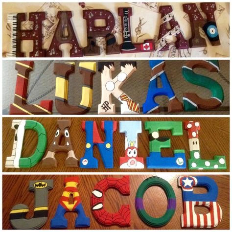 Hand painted wooden letters by: Lianne Berube Themes: Music, Harry Potter, Super Mario, Super Heroes. Harry Potter Painted Letters, Letters Harry Potter, Wooden Letter Ideas, Letter From Hogwarts, Painted Wooden Letters, Mario Room, Letter Door Hangers, Painted Wood Letters, Letters Diy