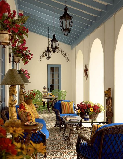 Brilliant blues and bold yellows are coupled with a relaxing ambiance inside this Mediterranean porch Modern Mediterranean Decor, Mediterranean Patio, Spanish Decor, Mexican Home, Mediterranean Home Decor, Spanish Style Home, Casas Coloniales, Spanish Style Homes, Hacienda Style