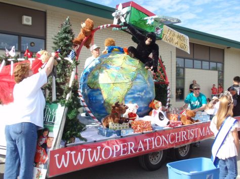 Our Operation Christmas Child float in the Bear Paw Parade in Eagle River Alaska. Christmas Around The World Parade Float Ideas, Shoebox Crafts, Christmas Floats, Parade Float Ideas, Shoebox Project, Eagle River Alaska, Operation Shoebox, Shoe Box Crafts, Christmas Parade Floats