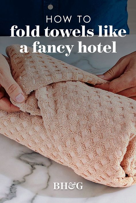 Try one of our easy, space-saving folding tricks. With the proper folding techniques, bath towels remain neatly stacked and ready to use whenever you need them. Use these folding methods to display fresh towels and give your bathroom a luxurious, spa-like feel. #howtofoldtowels #spabathrooms #guestbathroomtips #bhg How To Fold Towels For Display, Fold Towels For Display, How To Fold Bath Towels, Folding Bathroom Towels, Bath Towels Display, Folding Bath Towels, Folding Tricks, How To Roll Bath Towels, Bathroom Towels Display