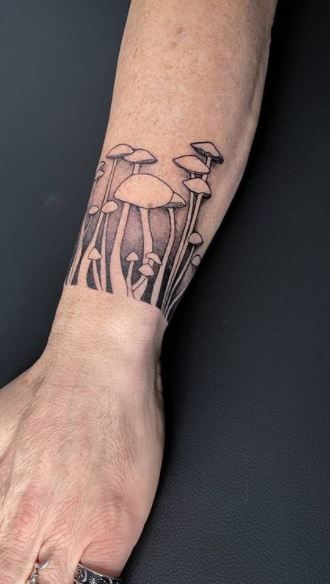 <<Check out more mushroom tattoos #tattoomenow #tattooideas #tattoodesigns #tattoos #mushroom #shroom Hongo Tattoo, Mushroom Tattoo Ideas, Above Elbow Tattoo, Groovy Mushroom, Tattoo Band, Cuff Tattoo, Mushroom Tattoo, Wrap Tattoo, Mushroom Tattoos