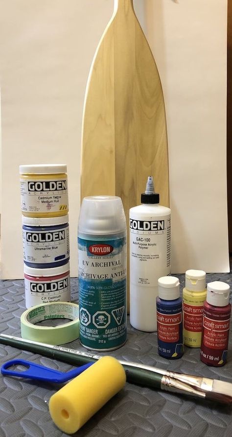 How To Paint A Paddle: Art at the Cottage in Six Easy Steps - MuskokaStyle Painted Canoe Paddles Diy, Painted Oars Paddles Diy, Wooden Paddle Ideas, Boat Paddle Ideas Diy Painted Oars, Painted Paddles Ideas, Painting Paddles, Lakehouse Art, Painted Oars Paddles, Decorative Paddles