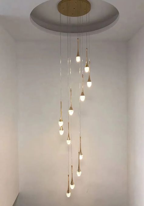 "Tears" Gold Staircase LED Chandelier | Modern.Place Gold Staircase, Chandelier Staircase, Led Chandelier Modern, Modern Pendant Lights, Suspended Lighting, Staircase Chandelier, Chandelier Modern, Area Lighting, Modern Staircase