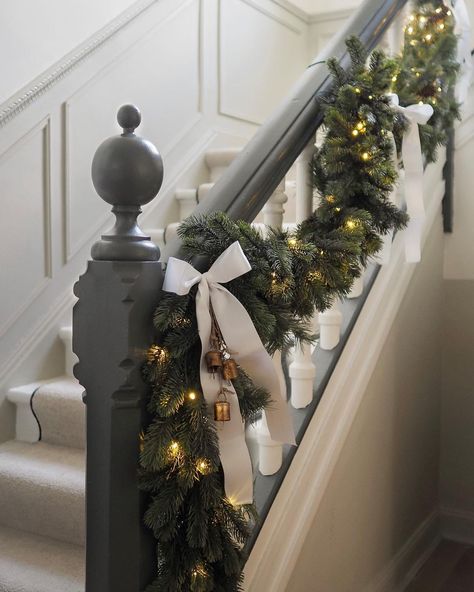 The hallway looking a little more dressed up ✨I love the look of garlands on stairs so much that when it eventually goes...it feels a bit… | Instagram Less Is More Christmas Decorating, Stairs Christmas Garland, Garland Stairs Christmas, Christmas Stairs Garland, Christmas Stair Garlands, Stair Christmas Garland Decoration, Garland On Stair Railing, Stairs Garland Christmas, Bannister Christmas Decor