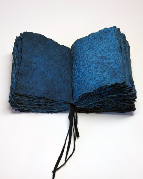 Handmade flax paper with indigo dye, konn’yaku paste, and momigami kneaded effect intended to give the look and feel of fabric. Simple all-along stitch over indigo dyed tapes. All cover papers handmade and hand-dyed by the artist. Momigami Projects, Momigami Paper Art, Artist Books Handmade, Handmade Book Covers, Dye Paper, Photo Book Cover, Personalized Sketchbook, Rust Dye, Indigo Dyeing