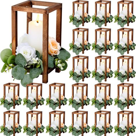 PRICES MAY VARY. Rich in Quantity: you will receive 24 pieces of wooden lanterns, their length, width, and height are about 5.47 x 5.5 x 10.59 inches, which are exquisite and elegant; Sufficient quantities can meet your decorative and replacement needs, and you can also share them with your family or relatives Solid Material: this decorative lantern is made of wood, which is wear resistant and not easily deformed, and can serve you for a long time; In addition, its margins are smooth and no burr Rustic Lantern Centerpieces, Lantern For Wedding, Wooden Candle Lanterns, Wedding Lantern, Rustic Wood Lanterns, Farmhouse Lantern, Lantern Wedding, Lantern Centerpiece, Lantern Centerpiece Wedding