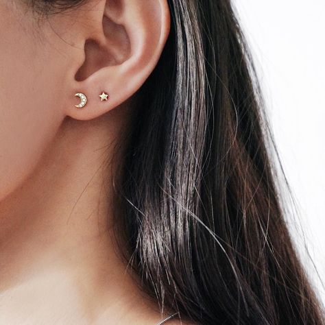 My moon and all my stars... cosmic ear party in our 14K solid gold star and moon stud set  #thingseyelove Double Ear Piercings, Piercing Inspo, Double Piercing, Second Piercing, Cute Ear Piercings, Ear Party, Piercing Ideas, Ear Piercing, Emerald Earrings