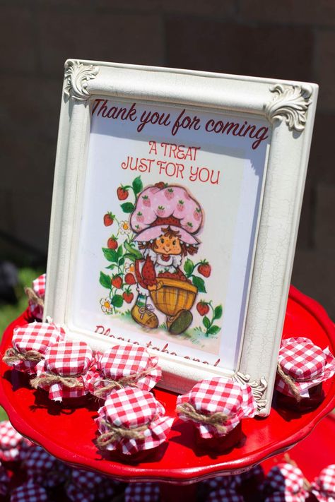 Layla’s Vintage Strawberry Shortcake 1st Birthday | CatchMyParty.com Strawberry Shortcake Baby Shower Ideas Girl, Strawberry Theme First Birthday Party Favors, 2nd Strawberry Birthday, Strawberry Shortcake Theme Party Ideas, Strawberry Shortcake Party Centerpieces, Vintage Strawberry Shortcake Party Ideas, Strawberry Shortcake Birthday Centerpieces, Strawberry Shortcake First Birthday Decorations, First Birthday Strawberry Shortcake