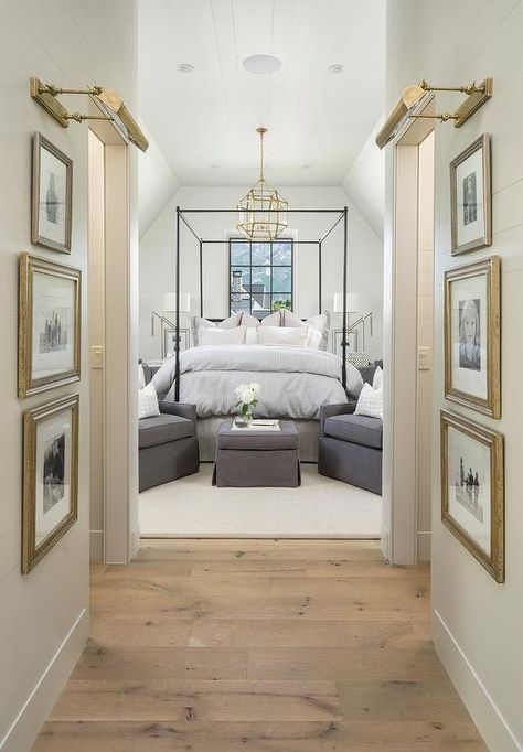 Pine wood floors separated shiplap hallway walls accented with gold leaf framed black and white photography lit by brass picture lights. Transitional Bedroom, Timeless Interiors, Interior Vintage, Decor Ikea, Foyer Design, Beautiful Bedroom, Remodel Bedroom, Awesome Bedrooms, Modern Bed