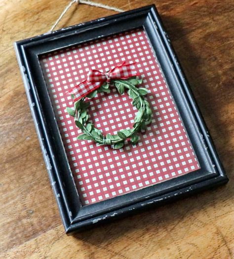 Quick and Easy Christmas Artwork Using Wrapping Paper | Noting Grace Christmas Framed Art Diy, Wrapped Wall Art For Christmas, Framed Wrapping Paper Wall Art, Diy Christmas Artwork, Framed Wrapping Paper, Leftover Wrapping Paper, Christmas Yarn Crafts, Christmas Wall Decor Diy, Diy Framed Art