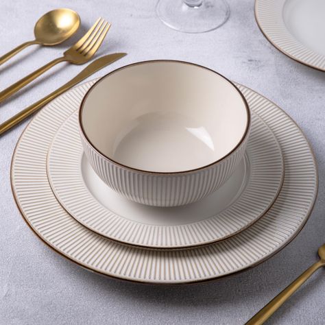 PRICES MAY VARY. UNIQUE MODERM DESIGN: Our 18-piece ceramic dinnerware set features a modern and elegant embossment design, allowing your dinner plate and bowl to be the star of the table. The glaze is pure snow-white with light embossment, and darkened rims, which look ultra classy and beautiful. This white dinnerware set is durable enough for everyday use for the family, yet sophisticated enough for that important dinner party or special event. LEAD-FREE & CADMIUM FREE: Our plates and bowls se Kitchen Plates Set, Dining Table Decor Everyday, Table Settings Everyday, Dinnerware Set Modern, Crockery Design, Dishware Sets, Corelle Dinnerware, Stoneware Plates, White Dinnerware Set