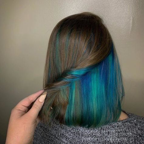 Peekaboo highlights: Woman with dark brown shoulder length bob with hidden blue and green highlights Blue Hair Color Highlights, Blue Hair Highlights, Hidden Hair Color, Peekaboo Hair Colors, Underlights Hair, Peekaboo Highlights, Hair 101, Peekaboo Hair, Hair Color Streaks