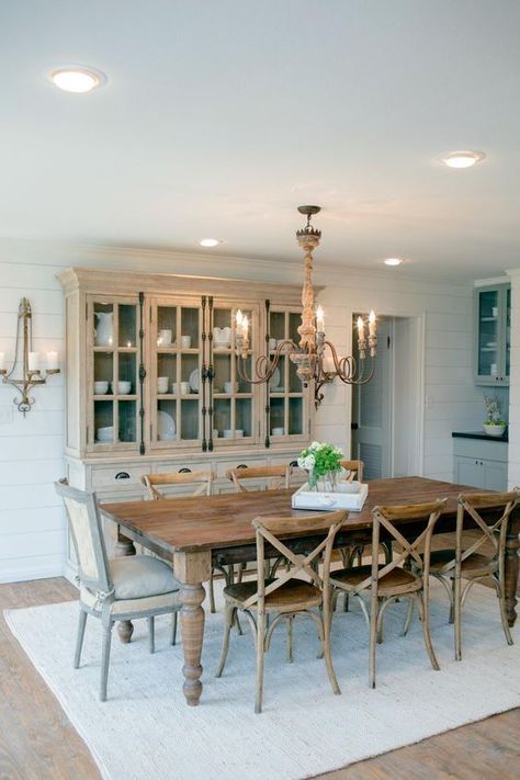 Different wood finishes in this dining room add texture without being too overwhelming, and this dining table can sit up to 8! HGTV Country House in a very Small Town, 20 Best Fixer Upper Rooms via A Blissful Nest Stile Joanna Gaines, Joanna Gaines Dining Room, Fixer Upper Dining Room, Dining Room Buffet Decor, Mixed Dining Chairs, French Country Dining Room Decor, Case In Stile Country, French Country Dining Room, Farmhouse Dining Room Table