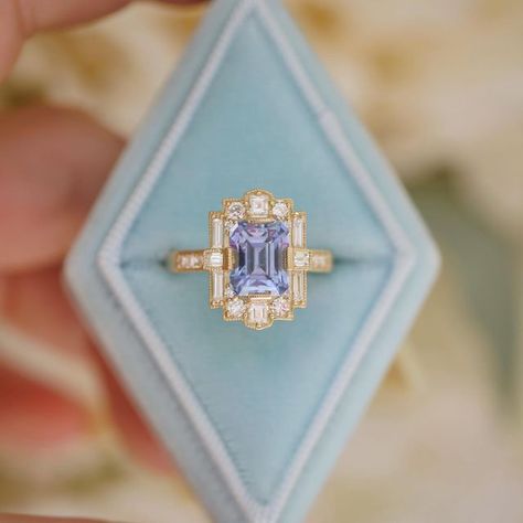 Berlinger Fine Jewelry on Instagram: "Raise your hand if you are as obsessed with cornflower blue sapphires as we are?! 🥹 This one of a kind deco halo with a blue/violet sapphire is what dreams are made of ✨ #sapphire #sapphirerings #artdeco #artdecojewelry #vintagejewelry #vintageinspired #altbride #engagementring #engagementinspo #jewelrylover #jewelryshop #uniquejewelry #uniquebridal #berlingerjewelry #uniqueweddingband #uniqueweddingring" Cornflower Blue Ring, Periwinkle Engagement Ring, Cornflower Blue Sapphire Ring, Art Deco Sapphire Engagement Ring, Violet Sapphire, Vowel Renewal, Ring Aesthetic, Cornflower Blue Sapphire, Rings In Gold