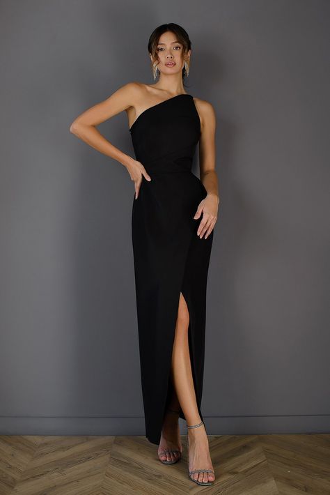 Enhance your fashion sense with ELAGIA's Black Asymmetric Sleeveless Maxi Dress, a blend of modern chic and classic elegance. Featuring an enticing asymmetrical design and a sleeveless silhouette, this dress exudes effortless sophistication, perfect for making a bold statement at upscale occasions. #blacksleevelessdress #asymmetricstyle #modernchic #elegantensemble #eveningattire #womensfashion #boldstatement #maxidressstyle Black Gala Dress, Black Tie Dress Wedding, Wedding Guest Dress Inspiration, Black Tie Wedding Guest Dress, Black Tie Wedding Guests, Black Tie Dress, Maxi Dress Sale, Black Bridesmaid Dresses, Wedding Attire Guest