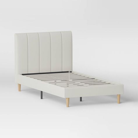 Bring comfort and style to your bedroom with this Twin Bed from Room Essentials™. Made from wood, this twin bed is draped in soft, cream-hued fabric upholstery for easy coordination with different decor styles. Featuring a low-profile design, it has a rectangular upholstered headboard for chic, modern style. Simply add a comfortable mattress and decorate it with the choice of sheets, pillows and comforters to create a charming sleeping nook. Room Essentials™: Everyday Value Cheap Twin Beds, King Upholstered Platform Bed, Ocean Room Decor, Sleeping Nook, Twin Size Bed Frame, Wood Platform Bed Frame, Twin Xl Bedding, Twin Bed Frame, Preppy Room