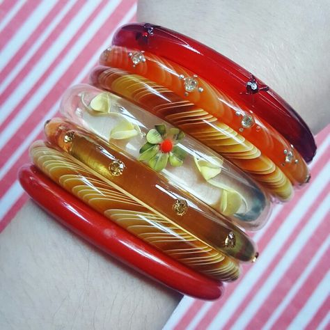 Spot the Splendette! Two modern "vintage inspired" plastic bangles, stacked with vintage bakelite, plastic, and reverse carved lucite bangles... Y2k Bangles, 80s Bangles, Colourful Bangles, African Bangles, Silk Bangles, Colorful Bangles, Bakelite Bracelets, Bakelite Jewelry, Plastic Bangles