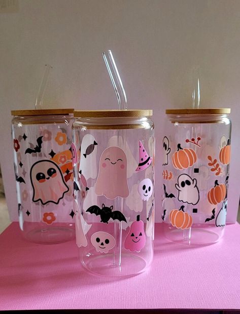 Glass Iced Coffee Cup with a glass straw and straw cleaning tool. 16oz (455ml) capacity. Halloween and Christmas designs available. ❤PRODUCT DETAILS❤ 1 Glass Tumbler  Pink, Orange Permanent Vinyl Bamboo Lid Glass Straw Straw Cleaning Tool ❤ADDITIONAL INFO❤ Themed Ice coffee glass tumblers. Halloween, Christmas and Teachers available. They have a capacity of approximately 455ml (16oz) Silicone seal around the bamboo lid to enable minimum spillage. The vinyl used is robust and waterproof. Please f Halloween Glass Cups, Ice Coffee Cup, Glass Iced Coffee Cup, Boo Basket, Halloween And Christmas, Ice Coffee, Glass Tumblers, Iced Coffee Cup, Glass Straws