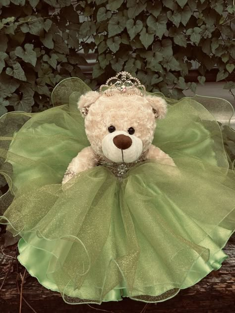 Mini Quinceañera Dress, Quinceanera Bear Green, Sage Green Teddy Bear Quince, Sage Green Quinceanera Dresses With Flowers, Quinceanera Dresses Princess And The Frog, Sage Green Quinceanera Teddy Bear, The Princess And The Frog Quince, Light Green Quencinera Dresses, Princess Tiana Themed Quince