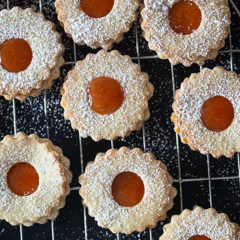 Try these apricot jam cookies – they are truly the best! They're soft and buttery, with a delectable filling of golden apricot jam. Apricot Pinwheel Cookies, Apricot Jam Cookies, Jam Filled Cookies, Apricot Cookies, Apricot Cookies Recipe, Icing Nozzles, Hazelnut Cookies, Pinwheel Cookies, Delicious Christmas Cookies