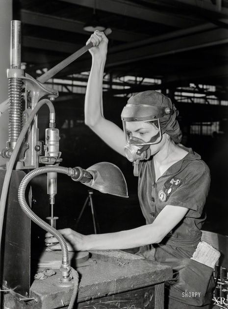 A 1942 photograph of a factory worker machining parts. Much of the wartime factory work was done by women as more and more men were sent off to the front lines. Wwii Women, Woman Mechanic, Robert Doisneau, Uncle Sam, Vintage Aircraft, Industrial Revolution, Working Woman, High Resolution Photos, Vintage Pictures