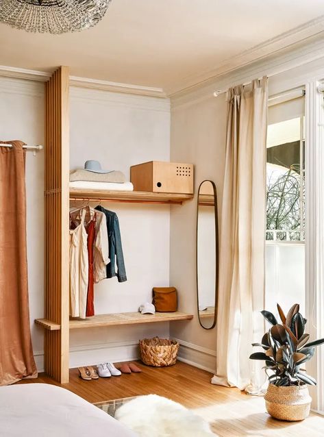 6 Decor Tricks Hiding at Dreamers Welcome in Wilmington | domino Solution For No Closet In Bedroom, Open Closet Guest Room, Clothes Racks Bedroom, Closet For Small Spaces, Cobalt Blue Bedrooms, Hotel Closet, Exposed Closet, Minimalist Closet, Pink Shower Curtains