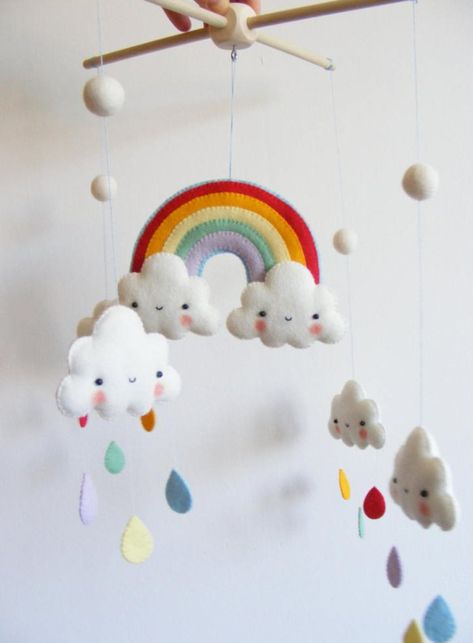 Huge List of DIY Baby Mobiles: Create one of these adorable DIY baby mobiles, or grab a baby mobile kit to make it even easier. Click through for a huge list. | www.sewwhatalicia.com Clouds And Rainbows, Rainbow And Clouds, Diy Baby Mobile, Baby Mobil, Diy Bebe, Felt Mobile, Diy Mobile, Baby Crib Mobile, Nursery Mobile