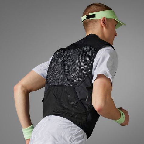 Need to carry extra fuel for your long run? No problem with this adidas gilet. Zip pockets stash gels and other essentials, and the lightweight mesh construction ensures a barely-there feel at any pace. AEROREADY handles moisture to keep you dry and comfortable for the duration. Cycling Clothes, Pocket Vest, Running Vest, Long Run, Adidas Running, Reduce Waste, Man Running, Cycling Outfit, Adidas Online