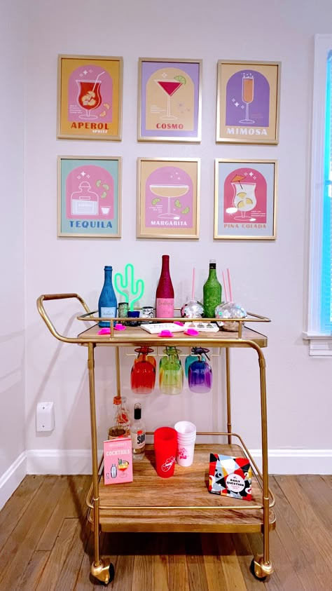 College Preppy Apartment, Funky Bar Cart Ideas, Groovy Bar Cart, Fun Bar Carts, Hot Pink Bar Cart, Cute Preppy Apartment, Bar Cart Dorm Room, Tropical Bar Cart, Colorful Bar Cart Styling