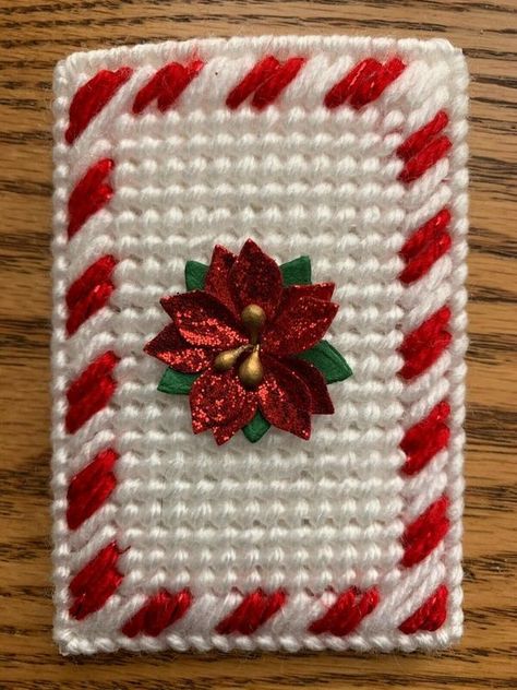 Handmade Needlepoint Plastic Canvas Gift Card Holder Candy Cane Poinsettia - new embellished gift card holder - materials: made from plastic canvas, yarn & floral embellishment - colors: white, red, green and gold - fits standard gift cards - decorated 1 side - shipping: USPS First Class Mail - payment: Paypal - made in a smoke free home Thank you for looking. Visit my store for other listings added weekly Plastic Canvas Gift Card Holder Pattern, Christmas Plastic Canvas Patterns Free, Plastic Canvas Candle Holders, Plastic Canvas Candle, Plastic Canvas Letters, Gift Cards Money, Floral Embellishment, Christmas Gift Card Holders, Plastic Canvas Ornaments