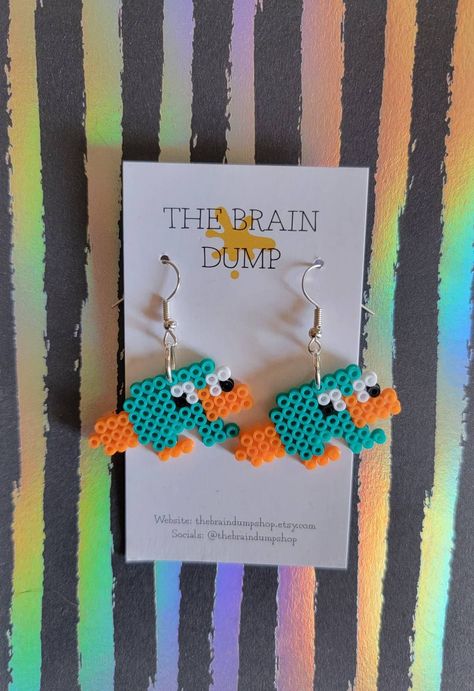 Agent P -erry! Cute Phineas&Ferb Inspired Mini Perler Beads Dangle Earrings - Hama Beads Jewelry Nostalgic Cartoon Accesories Fuse - The Platapus Named Perry - Kandi - Rave Jewelry - Statement Pieces Hypoallergenic & Nickel Free! Mini Bead Art, Cute Perler Bead Earrings, Phineas And Ferb Pixel Art, Mini Perler Bead Ideas, Mini Perler Bead Earrings, Lorax Perler Beads, Perler Bead Earring Holder, Shrek Perler Beads, Perler Beads Ideas Small Cute