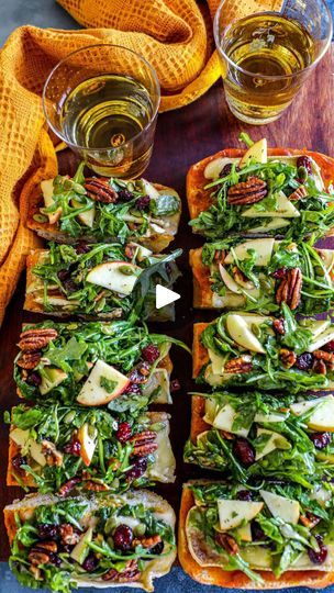 156K views · 14K reactions | Baked Brie Bread with Autumn Salad 🎃🧀🥖

Comment "Recipe" and I'll send you the full recipe! 

I had a hard time naming this recipe, but I had the opposite problem when it came to polishing off every piece. This was FANTASTIC and so easy to make. It feels kinda fancy and elevated but simple. I will absolutely make this for fall parties and it’s already on my thanksgiving menu. Save it and give it a try! 

Here’s what you need 👇
* Ciabatta Bread sliced open 
* Pumpkin Butter
* Brie Cheese sliced thin 

Autumn Salad Mixture 
* Arugula 
* Honey Crisp Apple cubed 
* Dried Cranberries 
* Pepitas 
* Candied Pecans 

Dressing 
*Olive Oil
* Apple Cider Vinegar 
* Honey or maple syrup
* Dijon Mustard 
* Salt 
*Black Pepper 
*Dried Thyme 

https://www.bonappeteach.com Baked Brie Bread, Fancy Party Food, Brie Bread, Brie Crostini, Appetizer Bread, Honey Crisp Apple, Honey Crisp, Fall Parties, Fall Appetizers