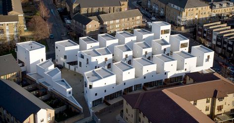 Low-rise, high-density housing attempts to combine the best elements of both urban and suburban development schemes. Peter Barber, Concrete Siding, Architecture Foundation, Collective Housing, Oscar Niemeyer, Victoria Park, Social Housing, Affordable Housing, Residential Architecture