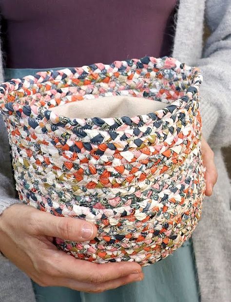 Make a Braided Basket from Fat Quarters or Scraps - Quilting Digest Braided Baskets How To Make, Scrap Fabric Basket Tutorial, Textile Baskets Made From Fabric Scraps, Rag Baskets Scrap Fabric, Braided Fabric Basket Diy, Scrappy Basket Tutorial, Woven Fabric Basket Free Pattern, Braided Fabric Basket, Basket Making Diy Craft Ideas