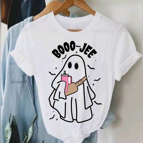 Boo-Jee Halloween Ghost T-Shirt Unisex Unisex T-Shirt Customized This Preshrunk 100% Cotton Tee Brand: Gildan Adult Size Most 100% Cotton Preshrunk Machine Wash Cold With Like *** Let Me Know Your Size Before Purchase ** Available Sizes: Small/ Medium/ Large/ Extralarge/2xl Measurements Are Shown In Pictures! You Can Ask For Other Sizes Or Colors Before Purchase! I Can Customize Special Orders By Request, Remember The Price Depends On The Design You Request. Let Me Know If You Have Any Questions Cricut Halloween Shirts For Women, Winter Cricut Shirts, Winter Tshirt Designs, Halloween Tshirt Design Ideas, Halloween T Shirt Design, Funny Halloween Shirts For Women, Halloween T-shirt, Cricut Halloween Shirt, Svgs For Shirts